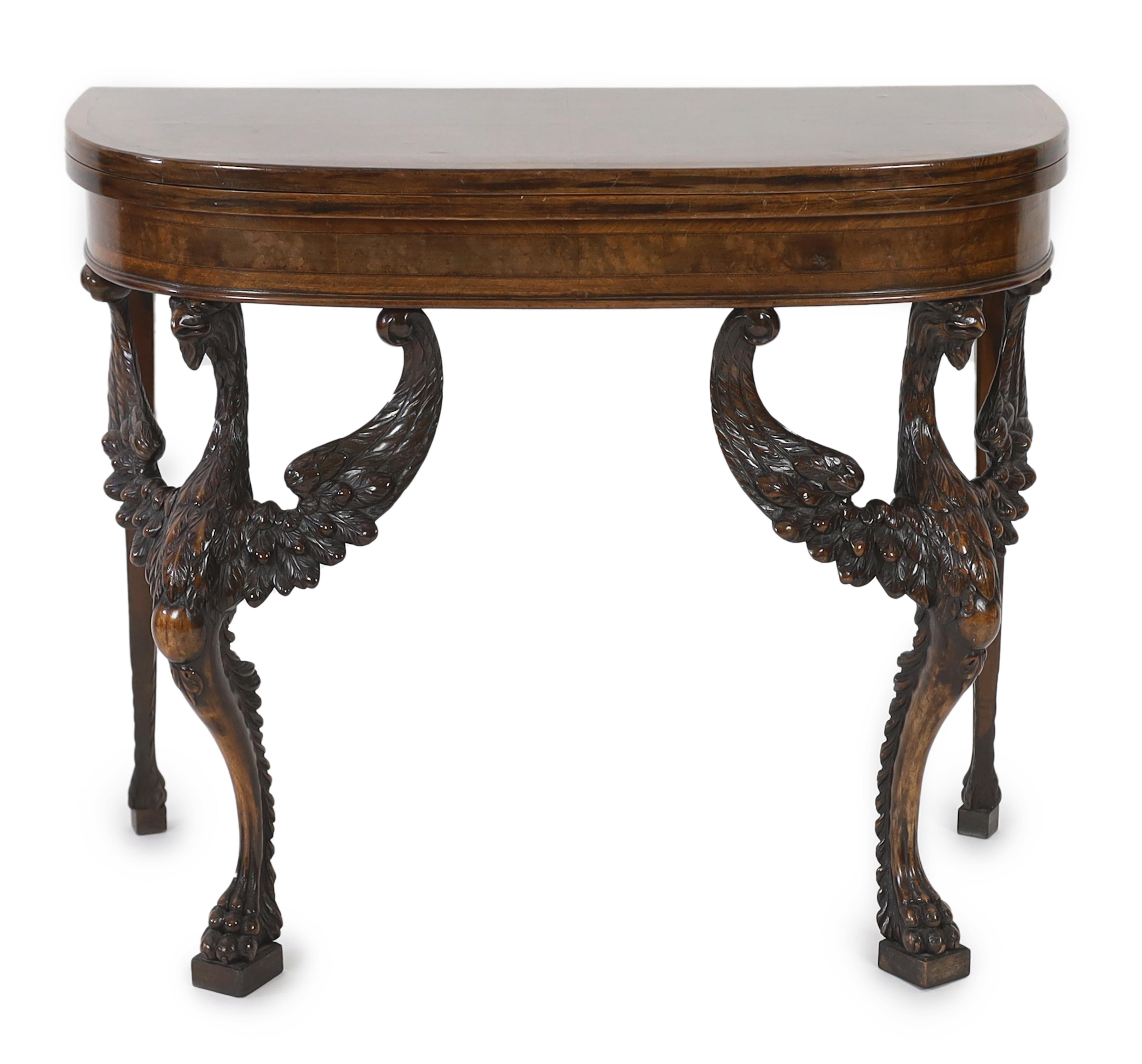 A mid 18th century style walnut card table